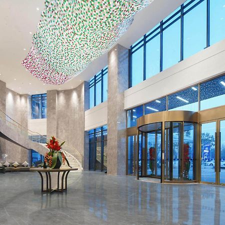 Park Inn By Radisson Nanchong Yilong Star City Plaza Εξωτερικό φωτογραφία