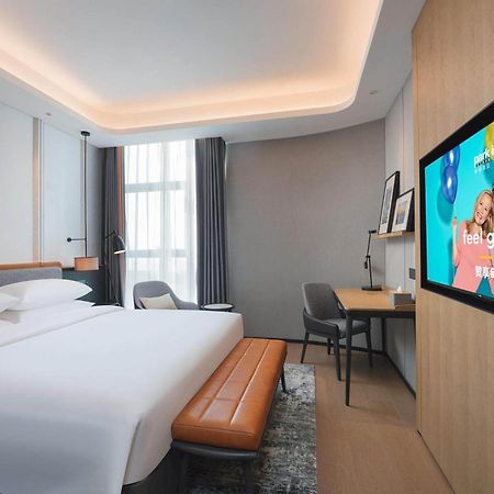 Park Inn By Radisson Nanchong Yilong Star City Plaza Εξωτερικό φωτογραφία