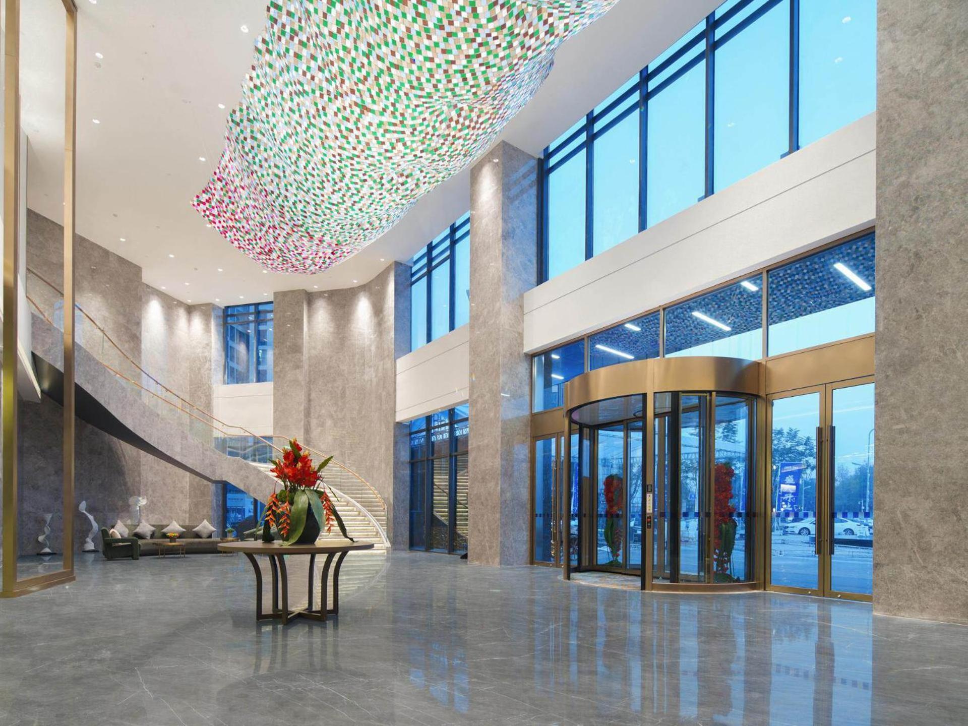 Park Inn By Radisson Nanchong Yilong Star City Plaza Εξωτερικό φωτογραφία