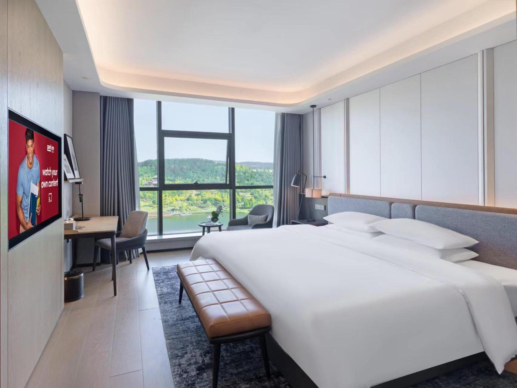 Park Inn By Radisson Nanchong Yilong Star City Plaza Εξωτερικό φωτογραφία