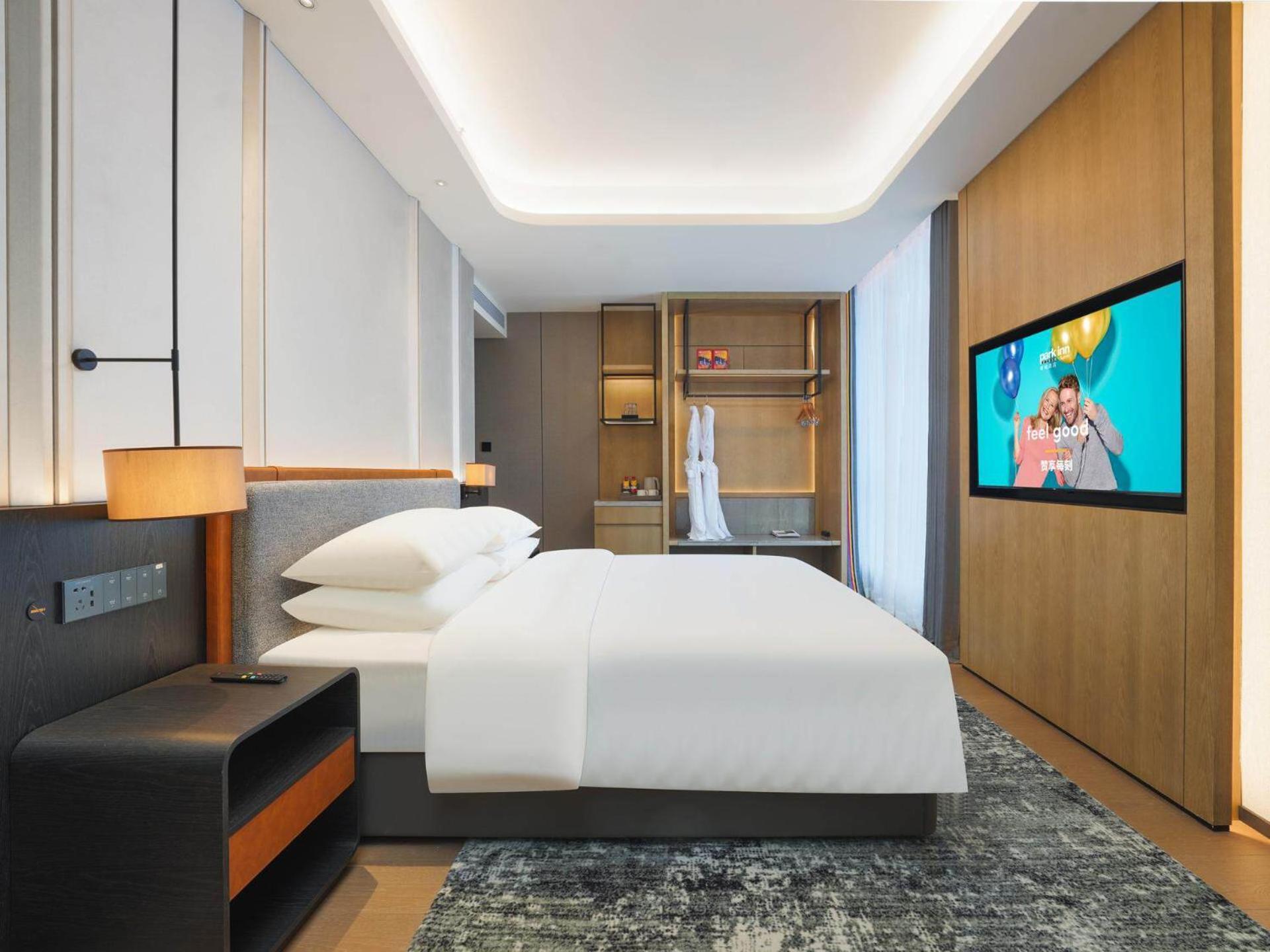 Park Inn By Radisson Nanchong Yilong Star City Plaza Εξωτερικό φωτογραφία