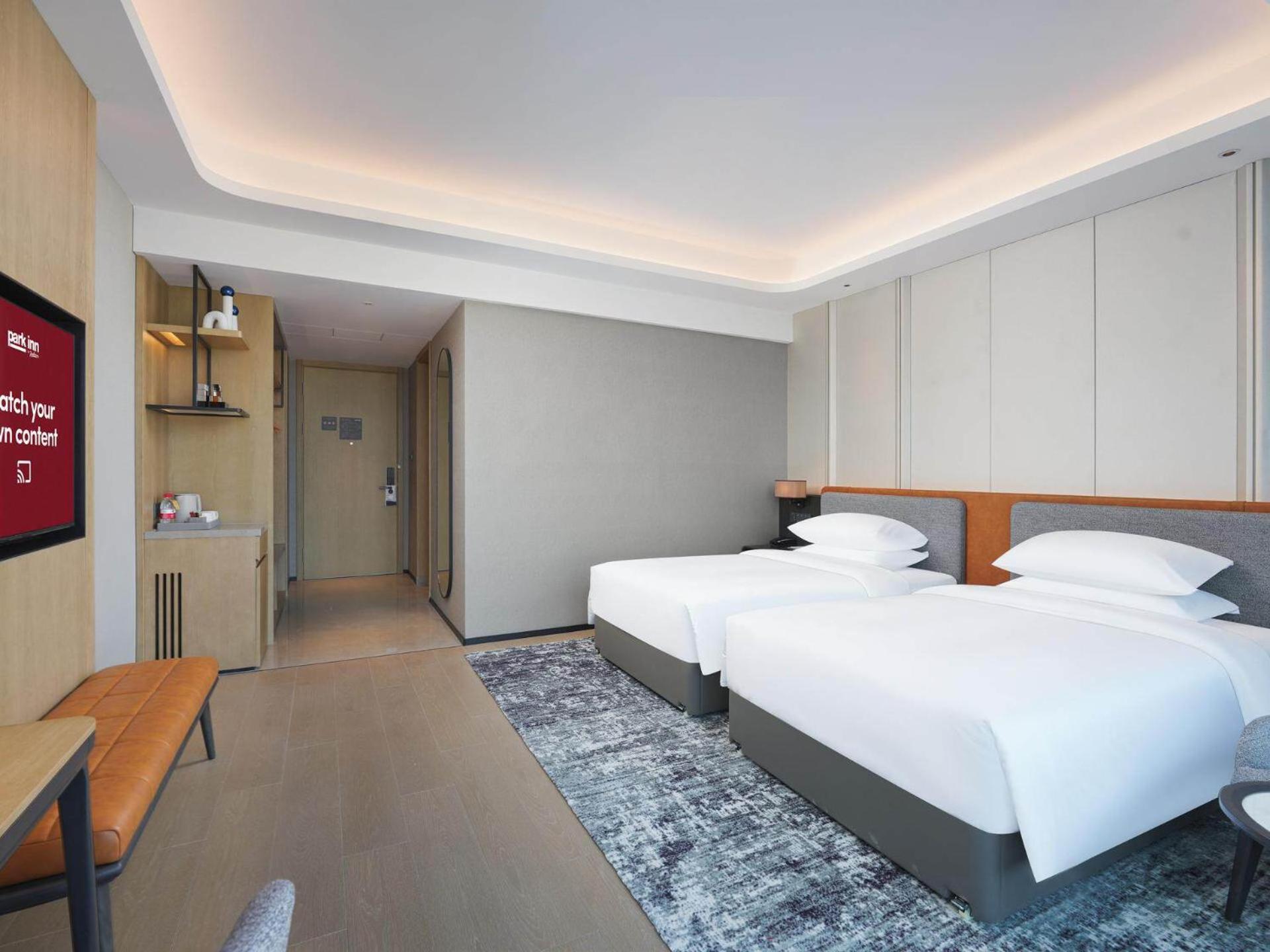 Park Inn By Radisson Nanchong Yilong Star City Plaza Εξωτερικό φωτογραφία