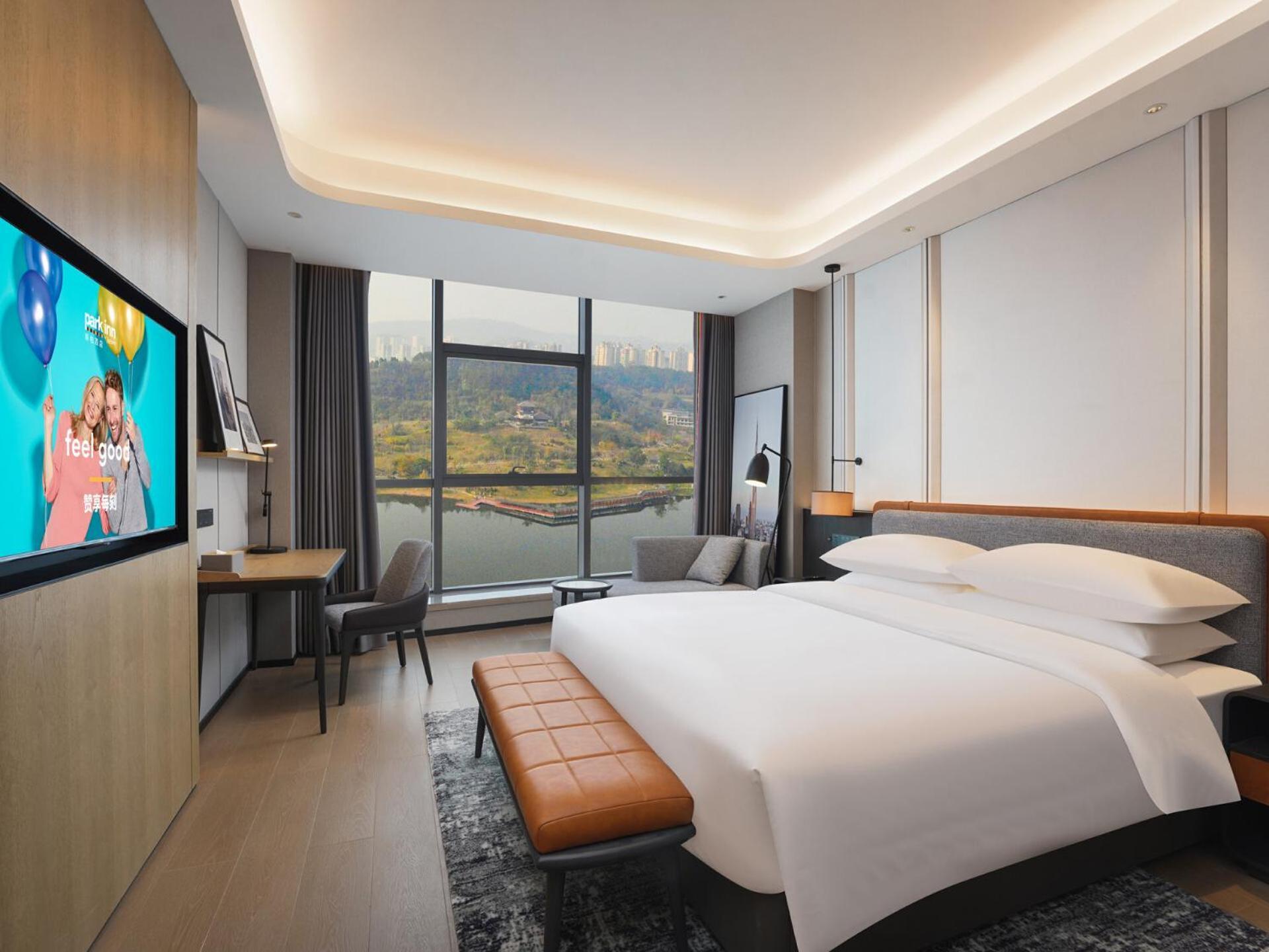 Park Inn By Radisson Nanchong Yilong Star City Plaza Εξωτερικό φωτογραφία