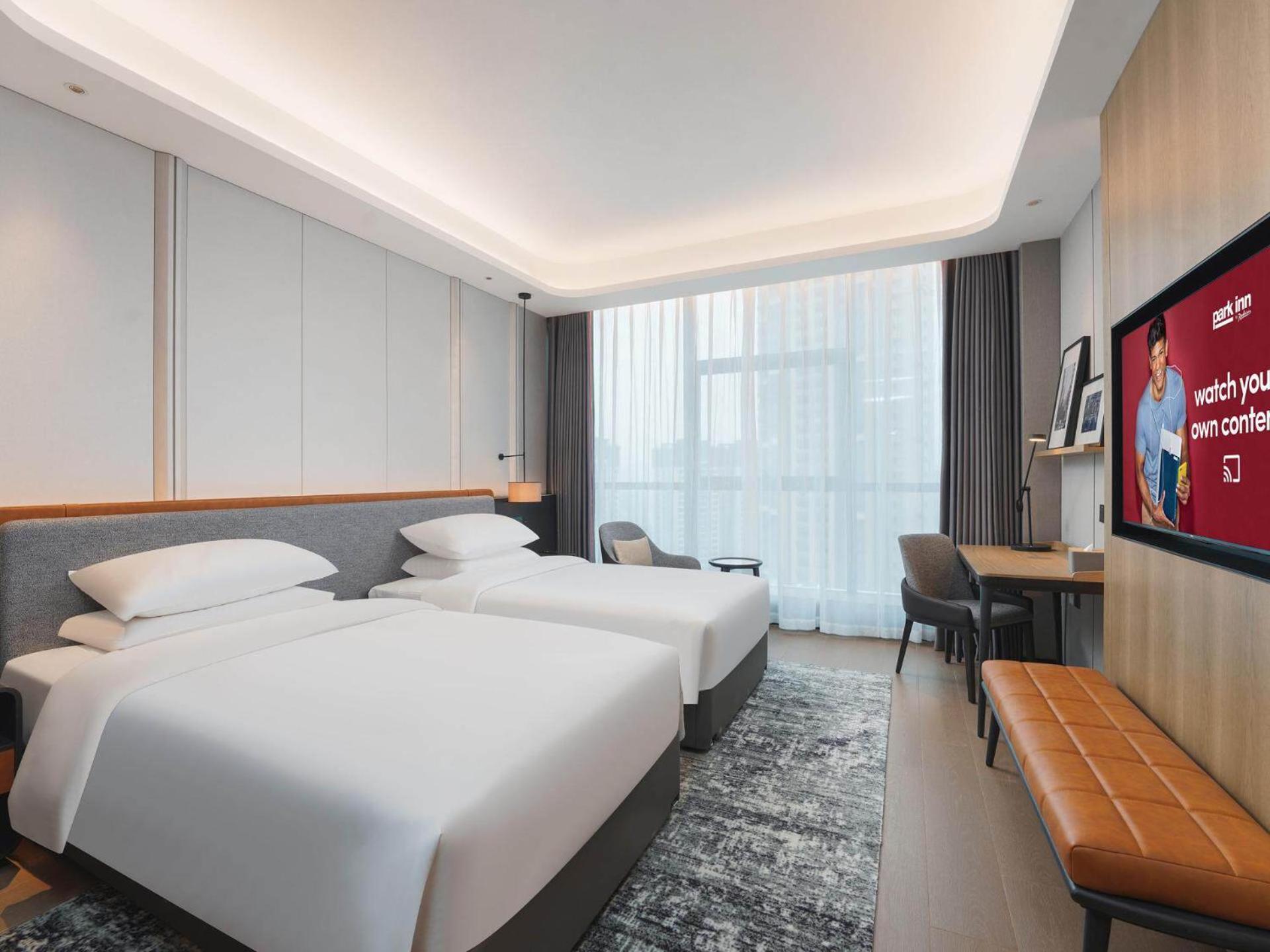 Park Inn By Radisson Nanchong Yilong Star City Plaza Εξωτερικό φωτογραφία