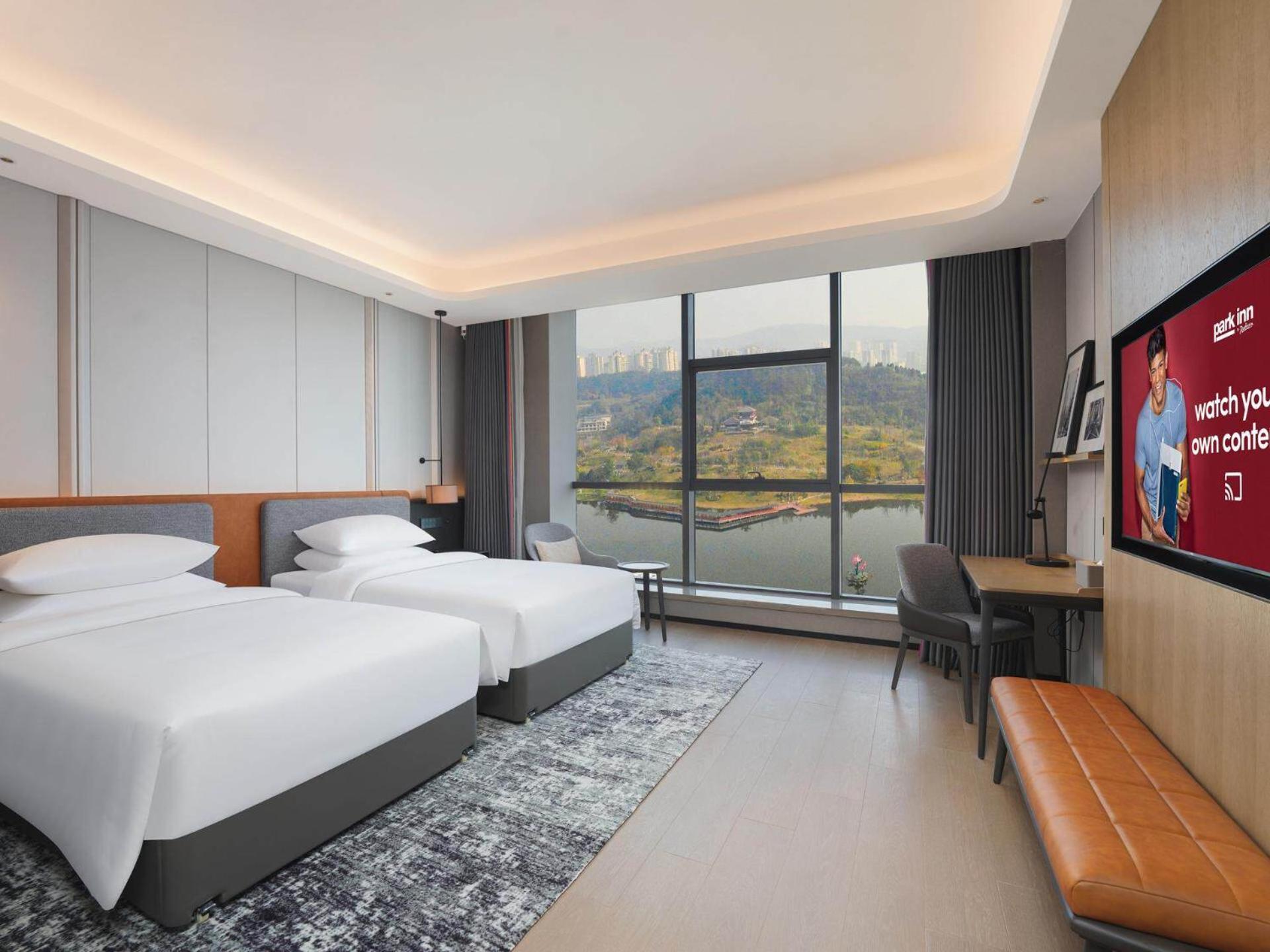 Park Inn By Radisson Nanchong Yilong Star City Plaza Εξωτερικό φωτογραφία
