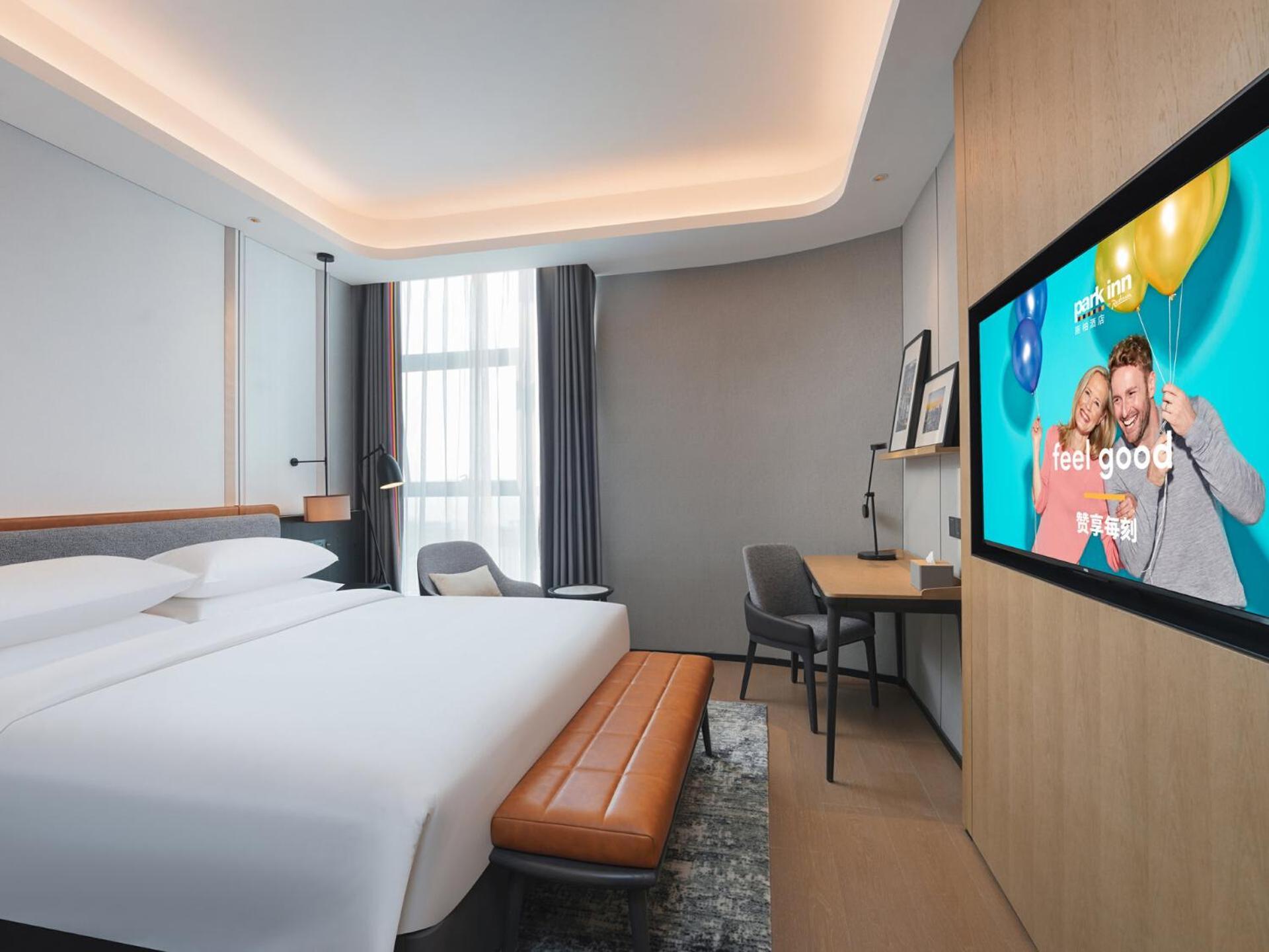Park Inn By Radisson Nanchong Yilong Star City Plaza Εξωτερικό φωτογραφία