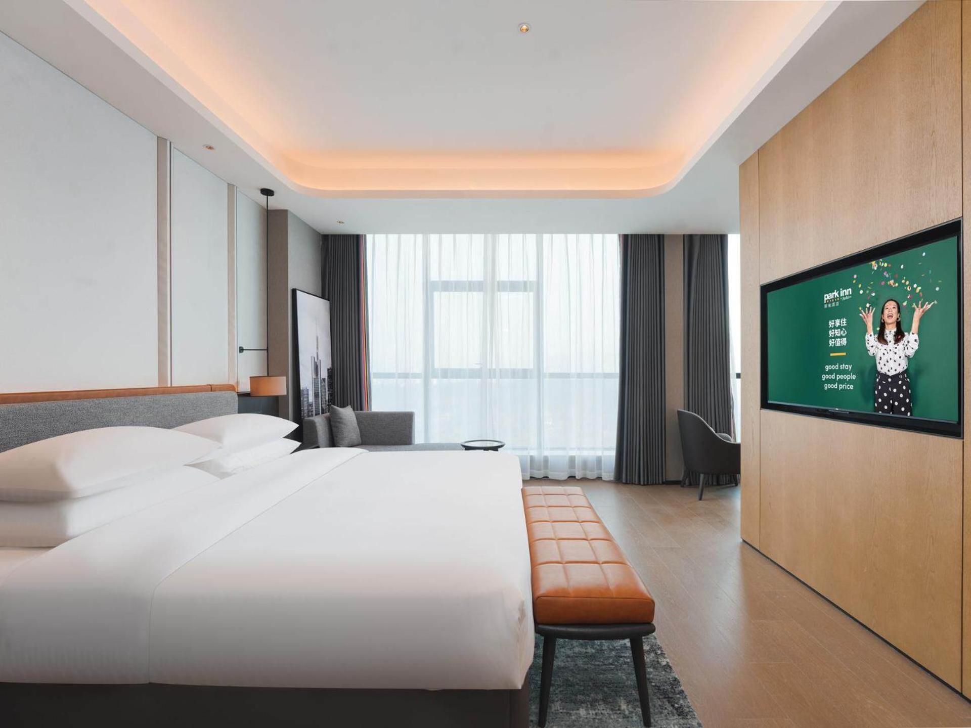 Park Inn By Radisson Nanchong Yilong Star City Plaza Εξωτερικό φωτογραφία