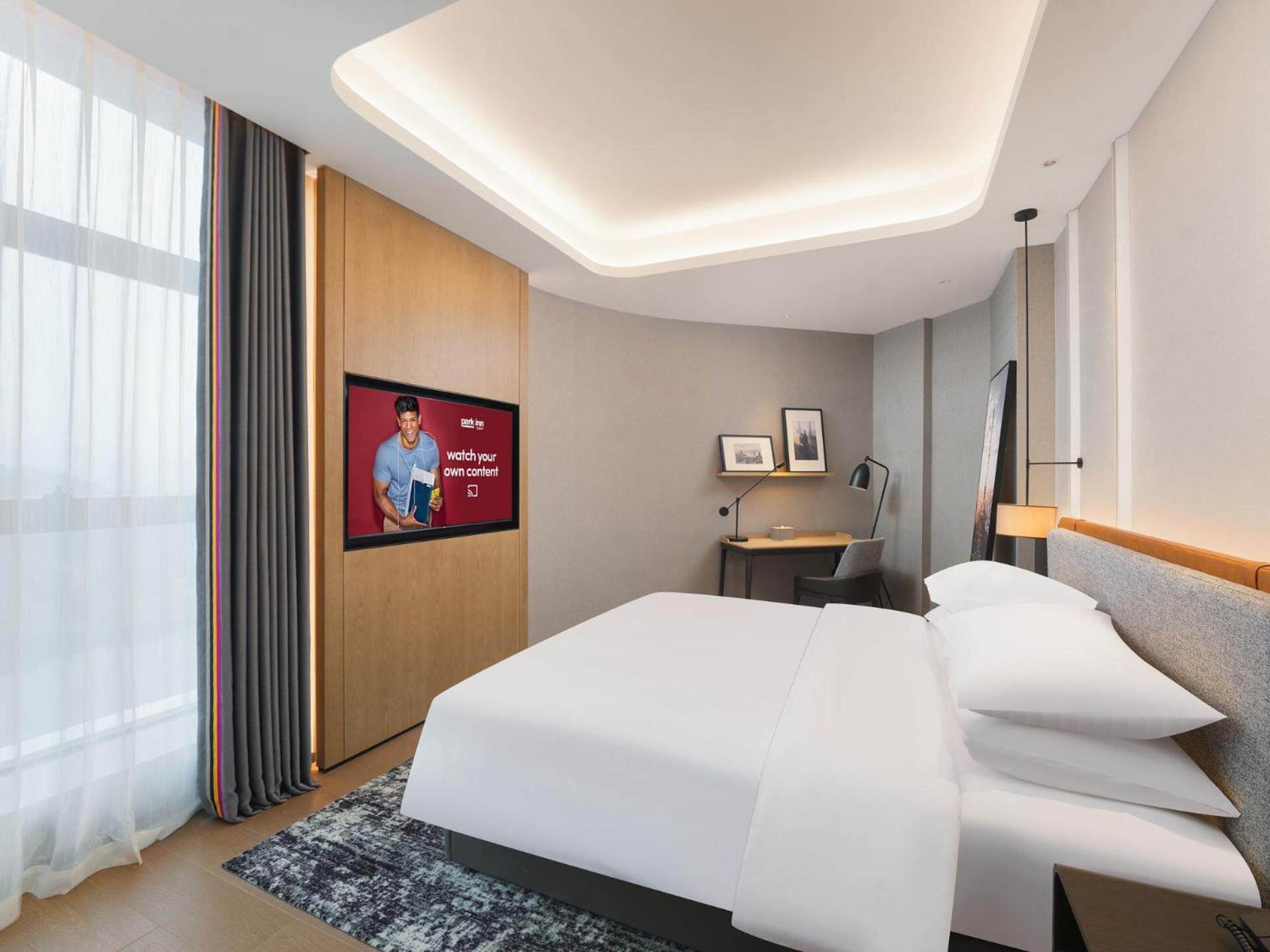 Park Inn By Radisson Nanchong Yilong Star City Plaza Εξωτερικό φωτογραφία