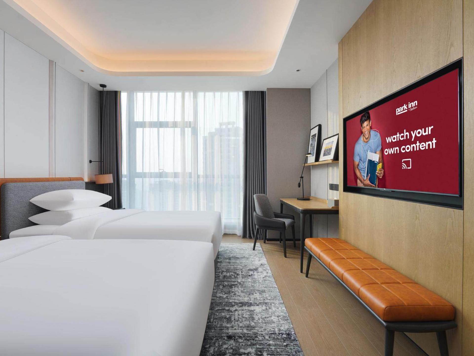Park Inn By Radisson Nanchong Yilong Star City Plaza Εξωτερικό φωτογραφία