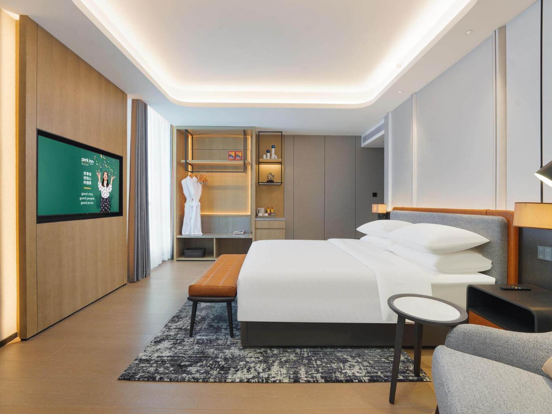 Park Inn By Radisson Nanchong Yilong Star City Plaza Εξωτερικό φωτογραφία
