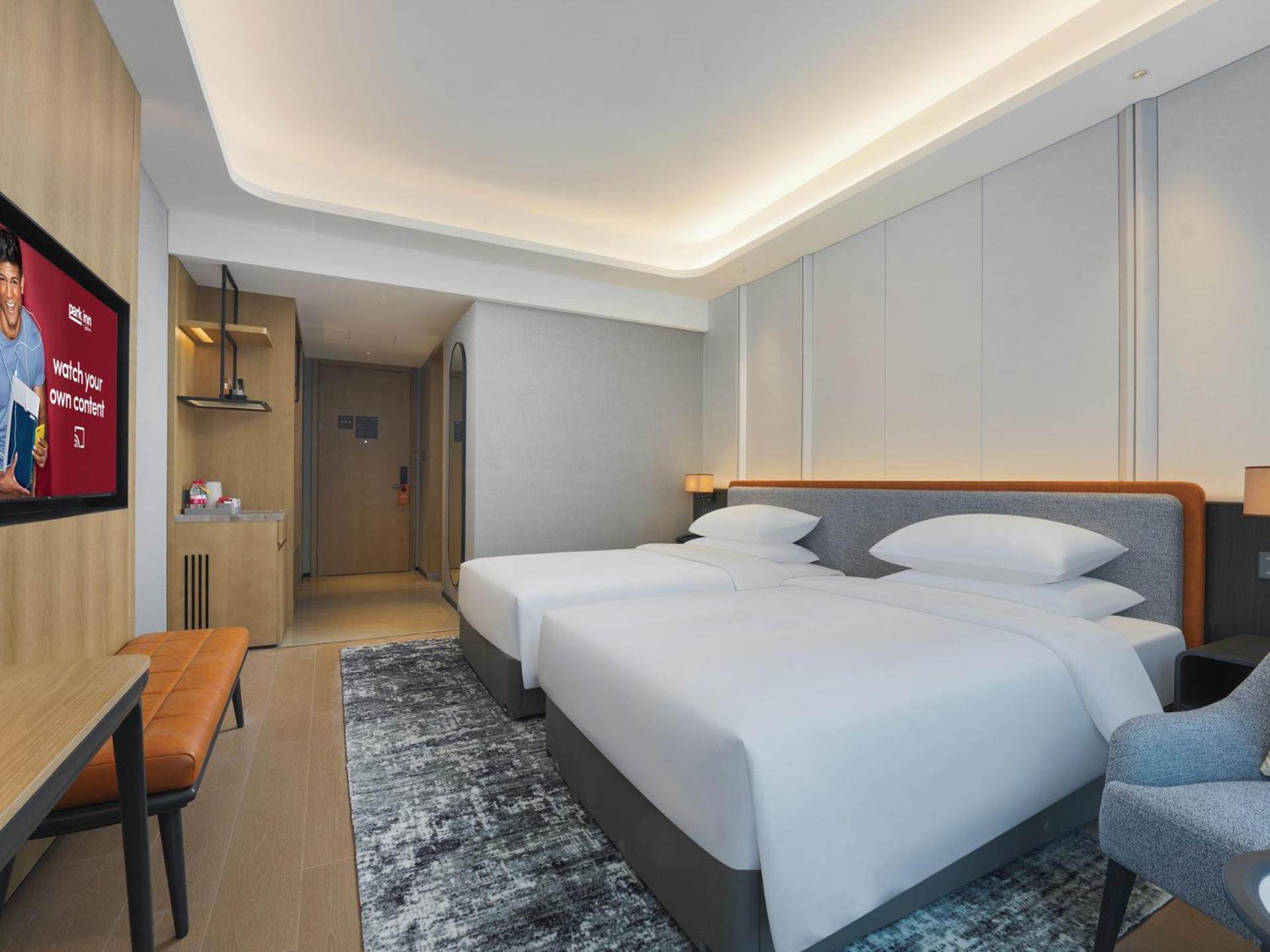 Park Inn By Radisson Nanchong Yilong Star City Plaza Εξωτερικό φωτογραφία