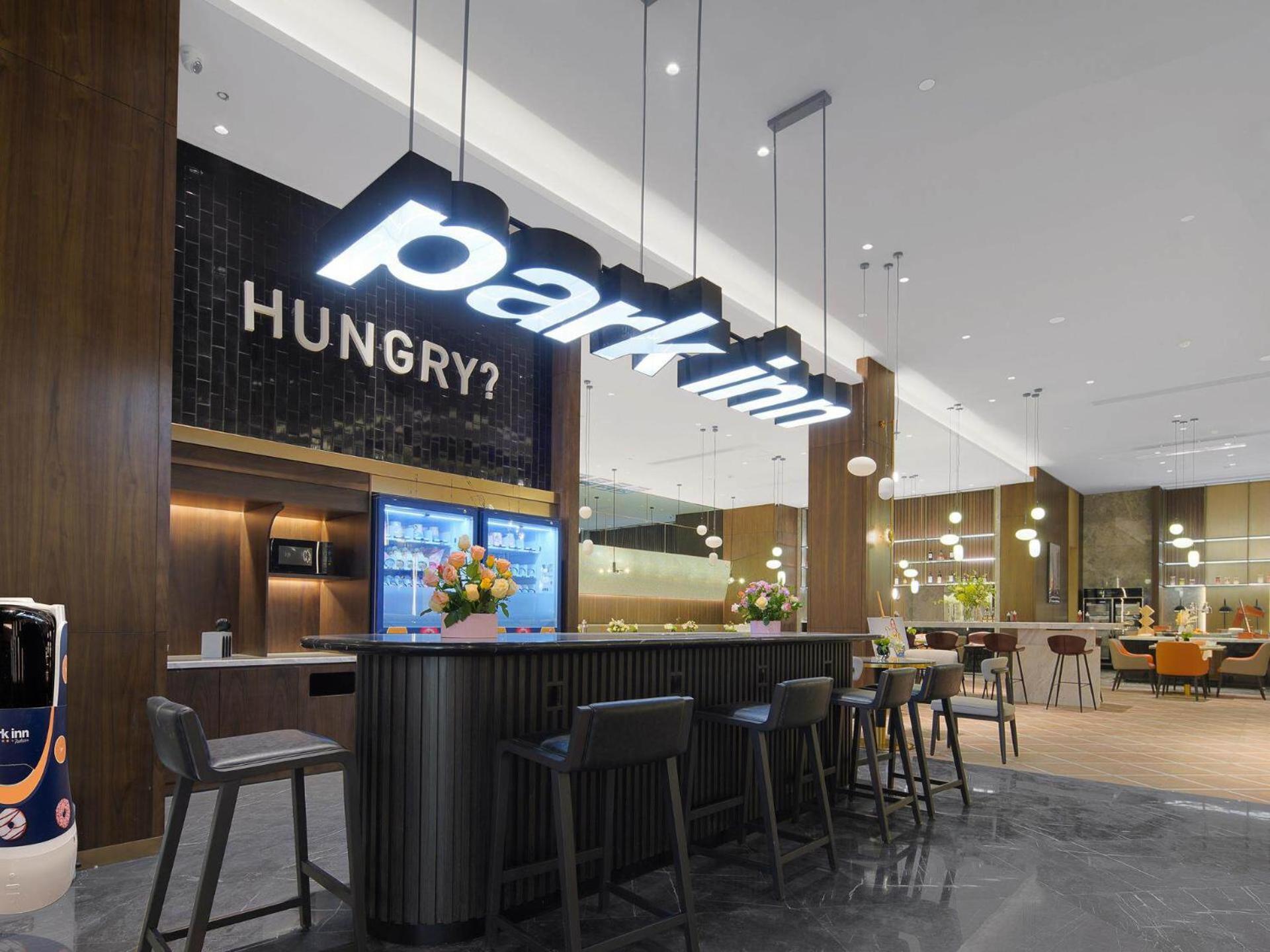 Park Inn By Radisson Nanchong Yilong Star City Plaza Εξωτερικό φωτογραφία