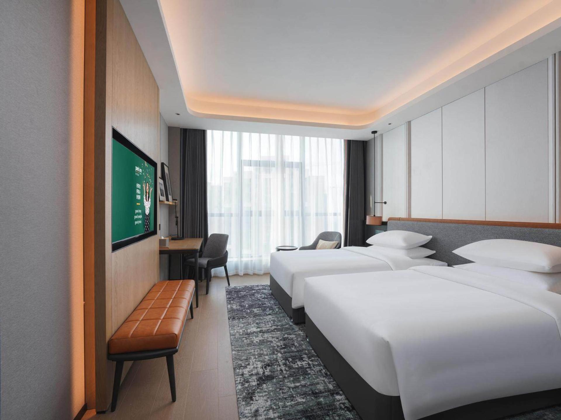 Park Inn By Radisson Nanchong Yilong Star City Plaza Εξωτερικό φωτογραφία