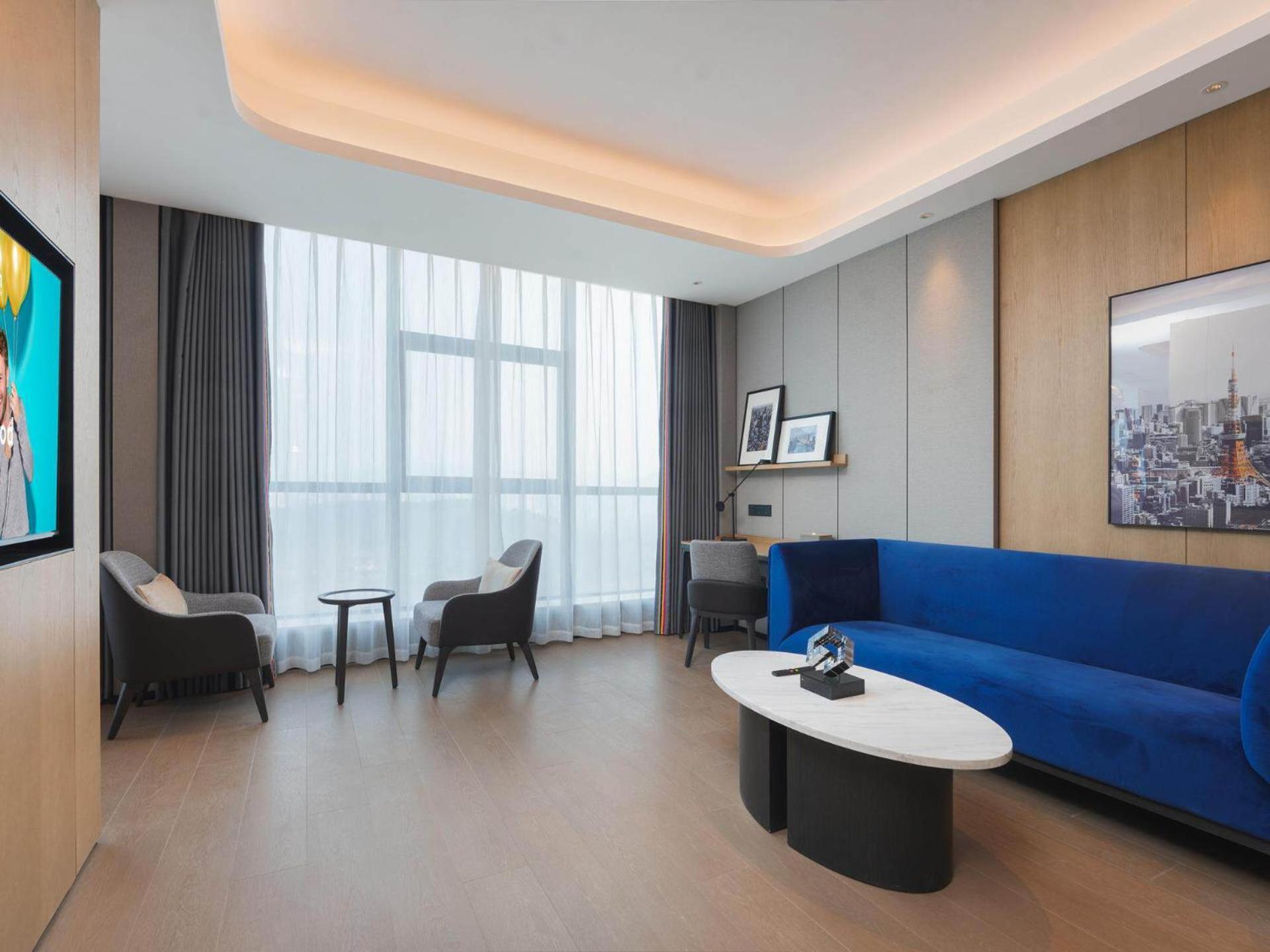 Park Inn By Radisson Nanchong Yilong Star City Plaza Εξωτερικό φωτογραφία